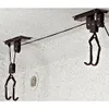 A ceiling-mounted bicycle lift system with two hooks. Produktbild-Vorschau
