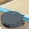 A robotic vacuum cleaner is shown on a floor, with a grid overlay indicating its cleaning path. Produktbild-Vorschau