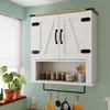 A wall-mounted cabinet with shelves and hooks, decorated with kitchen items and plants. Produktbild-Vorschau