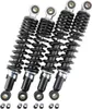 Four black shock absorbers are arranged diagonally on a white background. Náhled obrázku produktu