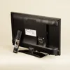 The back of a Telefunken television with its remote control. Produktbild-Vorschau
