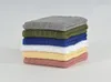 A stack of six colorful towels. Produktbild-Vorschau