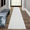 Tapis moelleux avec de beaux motifs de lignes en blanc Voir les images du produit 1