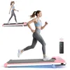 Two women are shown using a pink treadmill. One is running on a treadmill in the foreground, and another is walking on a treadmill in the background. Produktbild-Vorschau