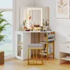 A vanity set with a lighted mirror and stool in a room with a window. Produktbild-Vorschau