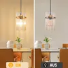 A split image showing a pendant light in a dining room setting, with one side showing the light on and the other showing it off. Anteprima dell’immagine prodotto