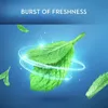 Mint leaves are shown with swirling light effects against a blue background, with text indicating a burst of freshness. Produktbild-Vorschau