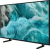A Samsung QLED TV with a black frame and stand, displaying a vibrant, abstract image on its screen. Náhľad obrázku produktu