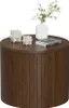 A round wooden coffee table with decorative items on top. Anteprima dell’immagine prodotto
