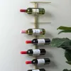 A wall-mounted wine rack with several bottles of wine. Náhľad obrázku produktu