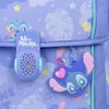 Close-up of a purple backpack with a Stitch character theme, showing a clip-on accessory and a keychain. Podgląd zdjęcia produktu