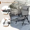 A grey reclining garden chair with an extended footrest, shown outdoors on a patio with stone wall and plants in the background. Inset images demonstrate how to extend and retract the footrest. Produktbild-Vorschau