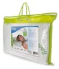 A pillow inside its packaging, with a woman demonstrating its use. Produktbild-Vorschau