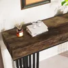 A close-up view of a wooden console table with decorative items on top. Náhľad obrázku produktu