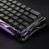 A close-up view of the corner of a gaming keyboard with purple backlighting. Produktbild-Vorschau