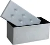 A light gray tufted ottoman storage bench is shown with its lid partially open, revealing the black interior. Produktbild-Vorschau
