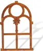 A rusted metal window frame with a gothic arch design, set against a white background. Produktbild-Vorschau