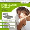 A woman sleeping peacefully on a bed, with marketing text and an image of a bed frame on the left. Produktbild-Vorschau