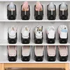 A white shelving unit displaying rows of shoe organizers holding various types of shoes and slippers. Produktbild-Vorschau