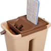 A close-up view of a mop bucket with a mop head inserted into the wringing mechanism. Náhled obrázku produktu