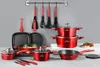 A collection of red cookware and kitchen utensils displayed against a light gray background. Podgląd zdjęcia produktu