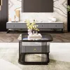 A modern living room with a coffee table in the foreground and a TV stand in the background. Voir les images du produit