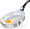 A frying pan with a fried egg in it, on a white background. Produktbild-Vorschau