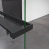 A close-up view of a black shower shelf with a green line indicating a glass panel. Produktbild-Vorschau