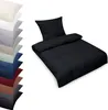 A black duvet cover and pillowcase set is displayed on a white background, with a stack of other colored bedding sets to the left. Produktbild-Vorschau
