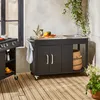 An outdoor kitchen setup with a grill cart and a sink station on a wooden deck. Anteprima dell’immagine prodotto