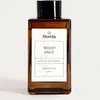 A brown glass reed diffuser bottle with a white label. Náhľad obrázku produktu