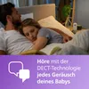 A couple sleeping in bed, with a baby monitor on the nightstand. Produktbild-Vorschau