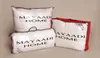 Three packaged pillows are displayed against a light gray background. Produktbild-Vorschau