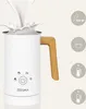 A white milk frother with a wooden handle is shown with milk being poured into it, creating a splash. Icons and text are present on the right side of the image. Produktbild-Vorschau