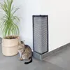 A cat sits next to a potted plant and a corner scratching post. Produktbild-Vorschau