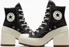 A pair of black Converse Chuck 70 De Luxe Heel boots are displayed against a white background. Produktbild-Vorschau