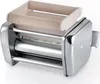 A close-up studio shot of a pasta maker attachment. Voir les images du produit