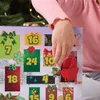 A child's hand opening an advent calendar. Podgląd zdjęcia produktu