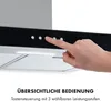 A close-up of a hand pressing a button on a kitchen range hood control panel, with text below describing its features. Produktbild-Vorschau