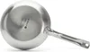 The underside of a metal frying pan is shown against a white background. Podgląd zdjęcia produktu
