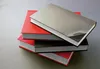 A stack of three books on a plain surface. Produktbild-Vorschau