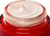 A close-up shot of the top of a jar of cream. Náhľad obrázku produktu