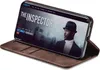 A smartphone in a brown flip case is displayed, showing a movie streaming interface on its screen. Produktbild-Vorschau