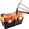 A toolbox with a pickaxe striking it, shown with motion blur to indicate impact. Produktbild-Vorschau