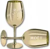 Two golden champagne glasses, one upright and one lying down, with the Moët & Chandon logo visible on both. Podgląd zdjęcia produktu