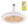 A close-up product shot of a white ceiling fan light with a beige fan grille, mounted on a white background. A remote control is shown in the upper right corner. Náhled obrázku produktu