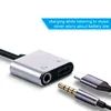 A close-up shot of a USB-C to 3.5mm audio adapter with a charging port, with a USB-C connector and a 3.5mm audio jack in the foreground. A marketing banner with text is visible in the top right corner. Produktbild-Vorschau