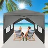 A couple relaxing on a beach under a canopy. Náhled obrázku produktu