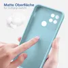 A hand is touching a light blue phone case, highlighting its matte surface and soft grip texture. A small pile of fluffy material is in the background. Produktbild-Vorschau