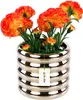 A ceramic pot with artificial flowers. Náhled obrázku produktu
